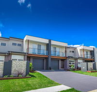 Escape At Nobbys Executive Townhouse 1 74 Pacific Drive - Accommodation Mooloolaba